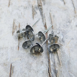 Öronstift i rostfritt stål, skålformad 13x6 mm