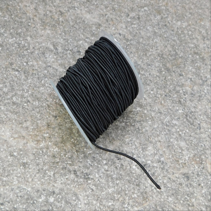 Elastisk tygklädd tråd svart 1.2 mm