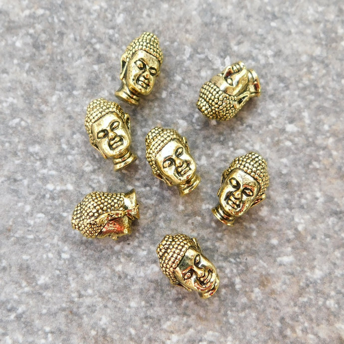 Buddha mellandel i färgad guldfärg