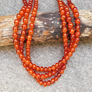 Krackelerade glaspärlor - orange 8 mm