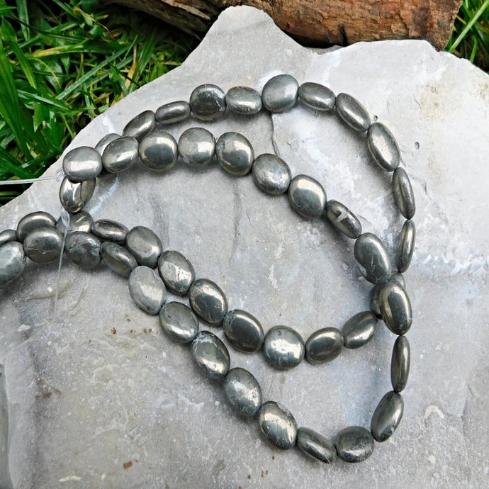 Pyrit oval 14x10 mm, sträng
